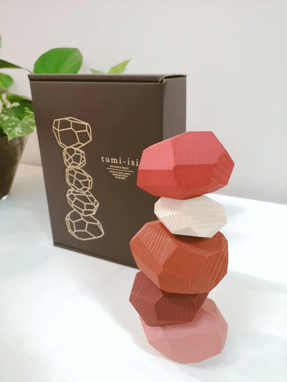 Tumi-isi balancing wooden blocks | BY: Daimon Kanno